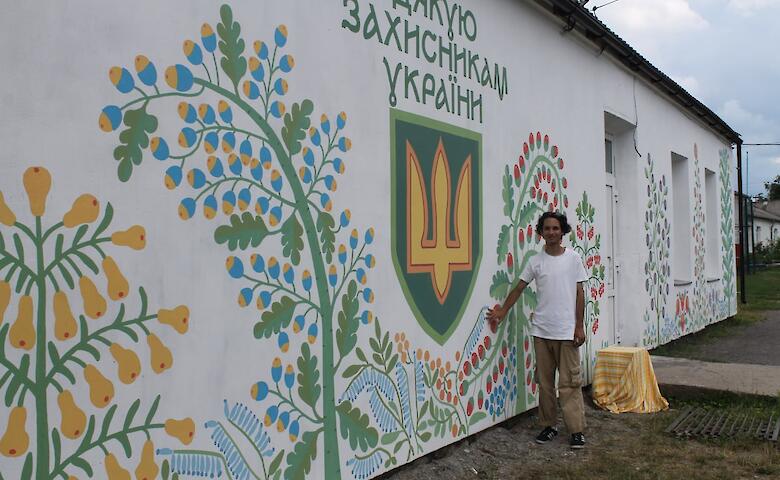 Художник из Триполья создал мурал на Подолье