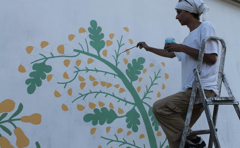Художник из Триполья создал мурал на Подолье