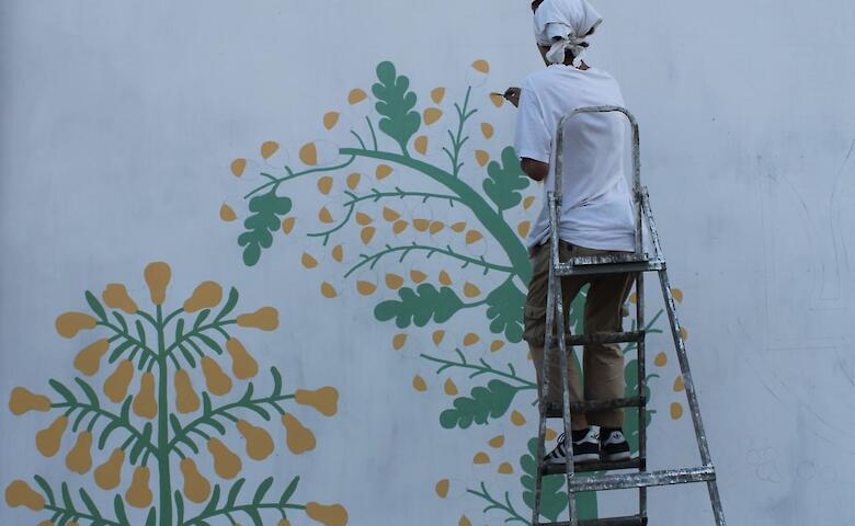 Художник из Триполья создал мурал на Подолье